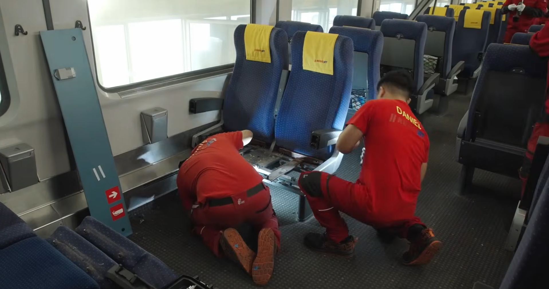 A colleague checking and preparing a carriage between services